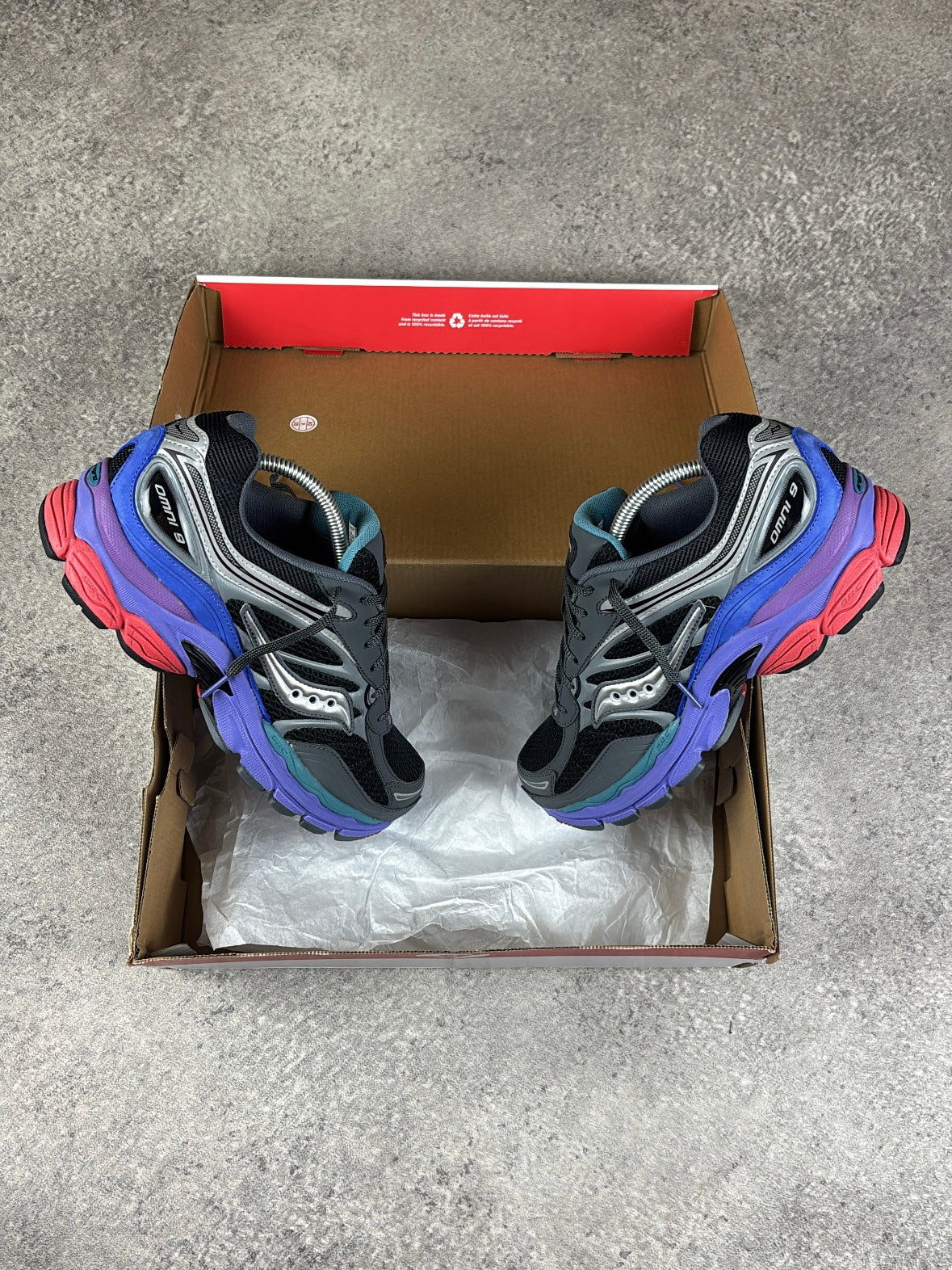 Saucony ProGrid Omni 9 Galaxy — pair in box top view